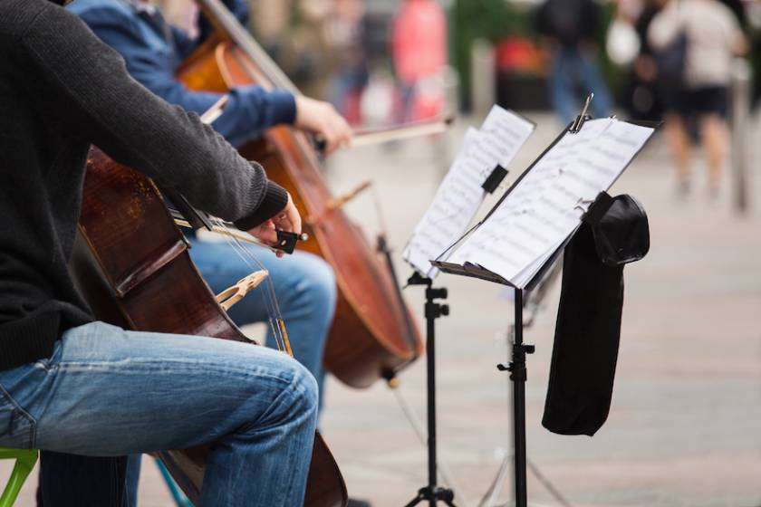 cello musicians playing on the street