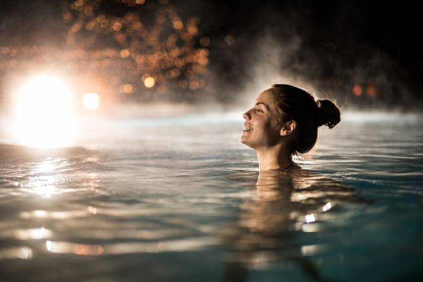 woman in a hot springs pool